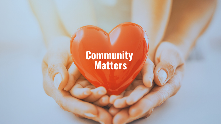 hands holding glass heart